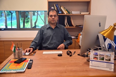 Shrisha Rao picture at his IIIT Bangalore desk - Credit: Swathi Sharma, IIIT Bangalore